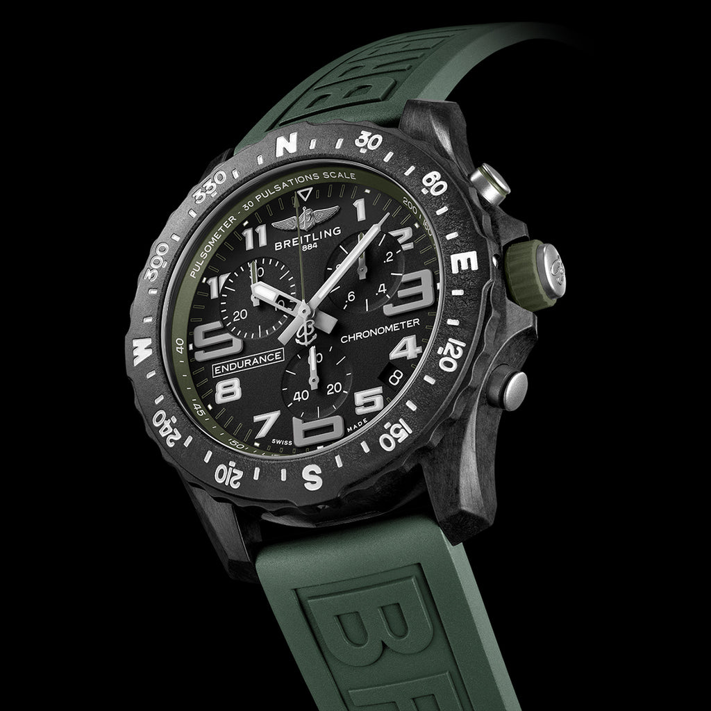 Breitling Endurance Pro watch on a green rubber strap. 