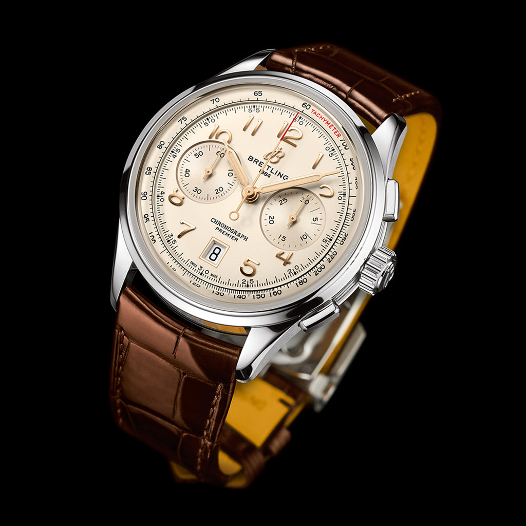 Cream dial Breitling Premier watch on a brown alligator strap. 