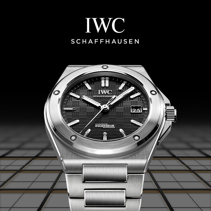 IWC Schaffhausen watch with black dial on a reflective surface