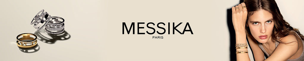 Model wearing gold Messika jewelry.