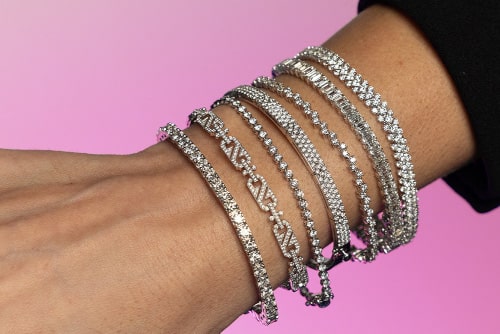 Model Wearing Seven Diamond Bracelets