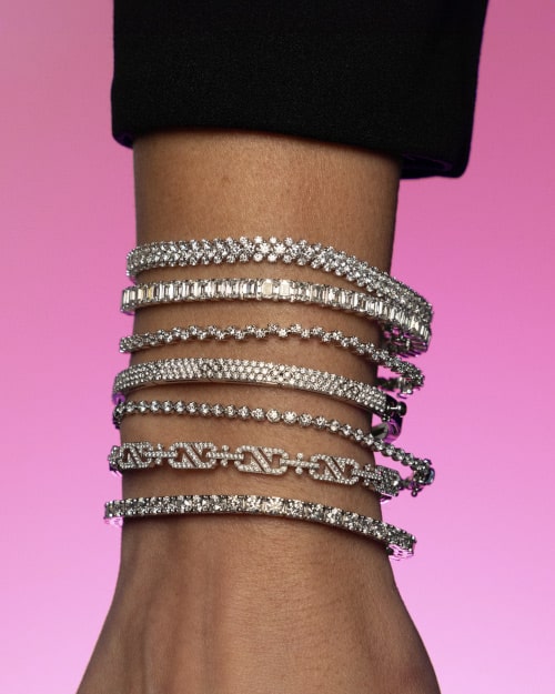 Model Wearing Seven Diamond Bracelets